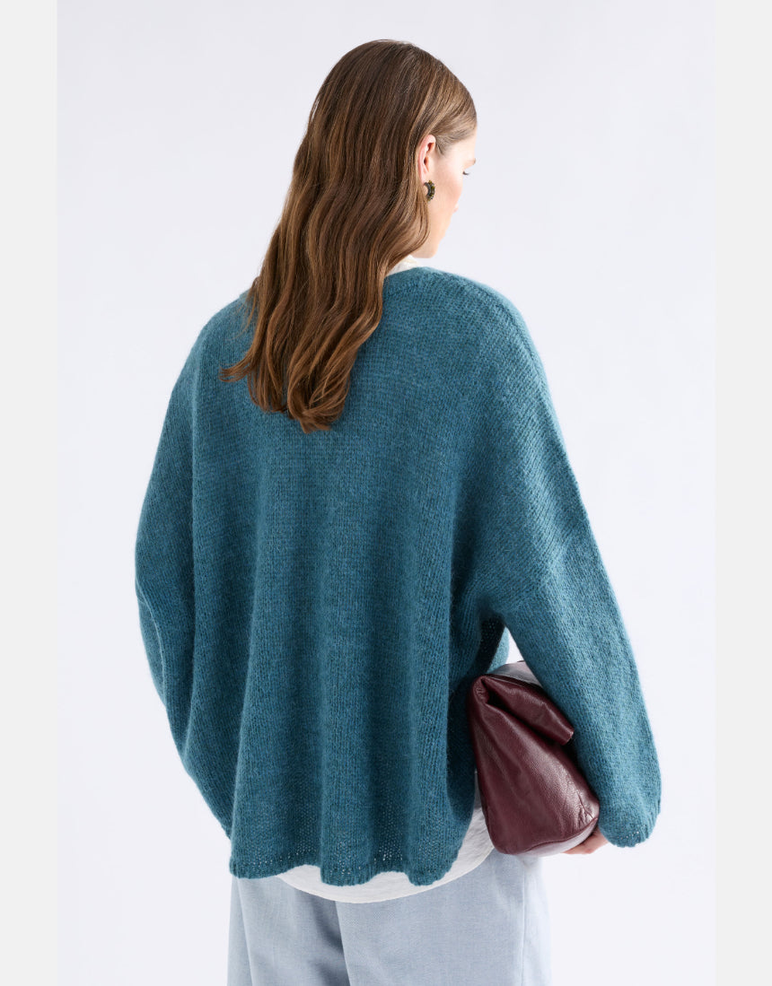 Elk Agna Sweater in stone blue, a cozy knit clothing piece featuring a relaxed fit and soft texture.