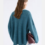 Elk Agna Sweater in stone blue, a cozy knit clothing piece featuring a relaxed fit and soft texture.
