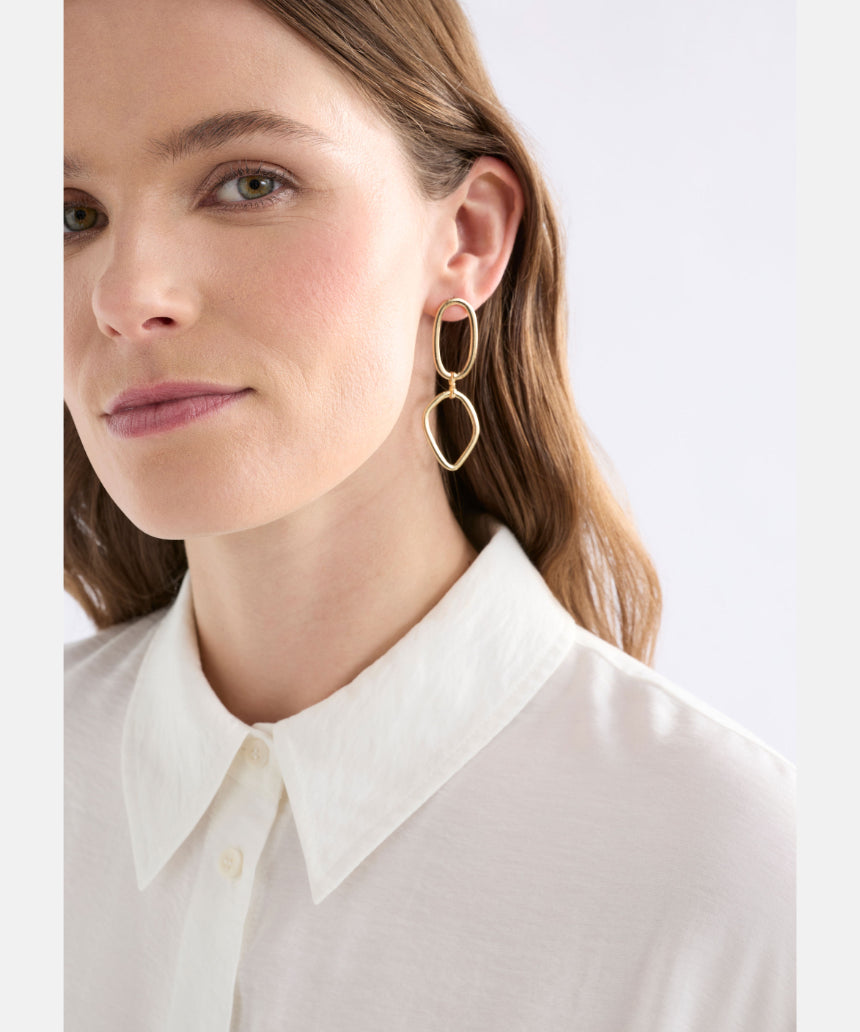 Elk Boden drop earrings in gold featuring sleek, modern design with a smooth, elongated shape and polished finish.
