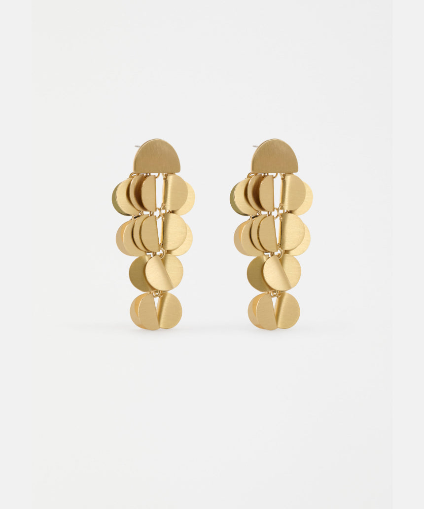 Gold Elk Ozett Drop Earring featuring a sleek, minimalist design with a smooth, elongated drop shape on a delicate hook.
