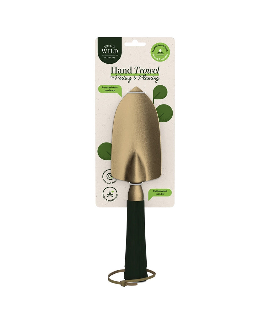 Green We The Wild hand trowel, a durable garden tool with a comfortable handle, ideal for planting and gardening tasks.
