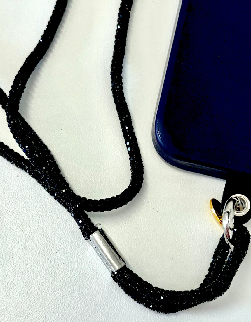 Salty Safari crossbody phone strap with sparkling diamonte accents, designed for secure and stylish wear.