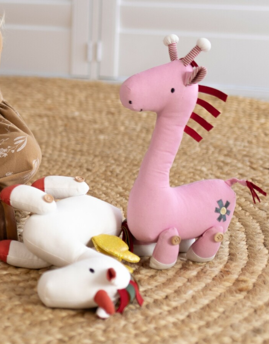 Lily & George Georgia Giraffe soft toy with a plush body and long neck, featuring soft yellow and brown colors.