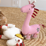 Lily & George Georgia Giraffe soft toy with a plush body and long neck, featuring soft yellow and brown colors.