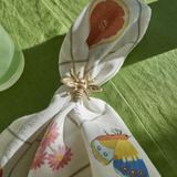 Kip & Co Prairie Linen 4-piece napkin set, soft linen fabric with a floral prairie pattern, ideal for table setting and decor.