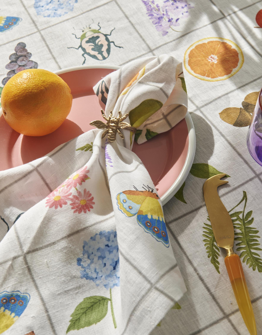Kip & Co Prairie Linen 4-piece napkin set featuring soft, textured linen fabric with a floral pattern for dining decor.