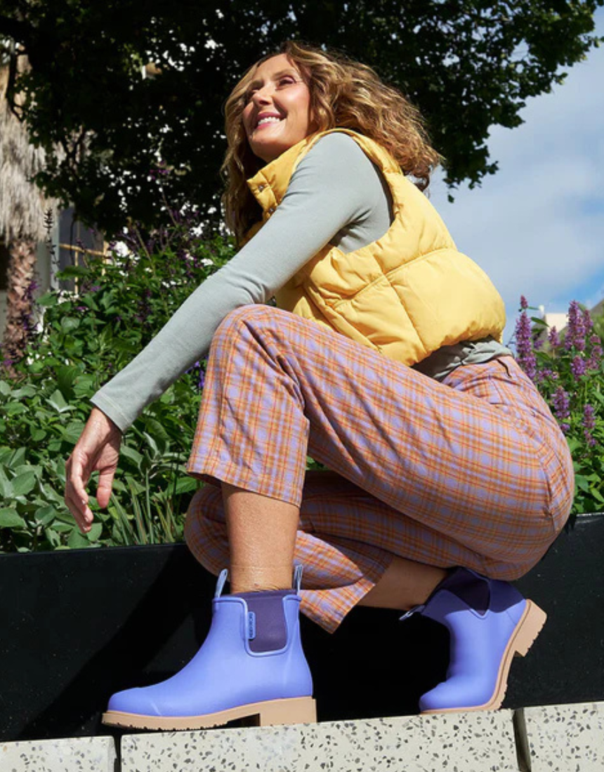 Violet and blue Merry People Bobbi gumboots with a glossy finish, waterproof rubber footwear for rainy weather.