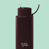 Frank Green 1L chocolate drinkwear bottle with sleek design and durable material, ideal for keeping beverages hot or cold.