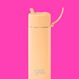 Frank Green Glow in the Dark Solar 595ml drinkwear bottle with luminous green design and spill-proof lid.