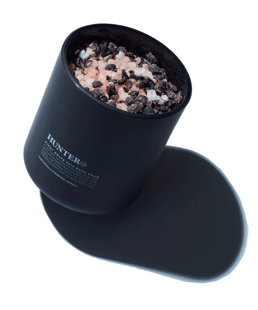Hunter Lab Pinot Grape Skin Bath & Body soak in a glass jar with label, showcasing a luxurious skincare product from Hunter Lab.