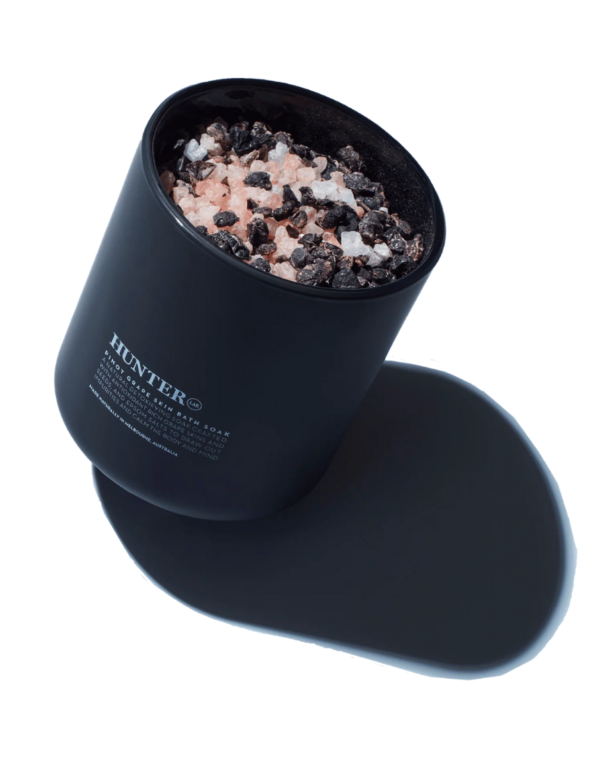 Hunter Lab Pinot Grape Skin Bath & Body soak in a glass jar with label, showcasing a luxurious skincare product from Hunter Lab.
