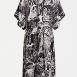 Elk Lento dress in soft fabric with a relaxed fit, featuring a V-neckline and long sleeves, displayed on a neutral background.