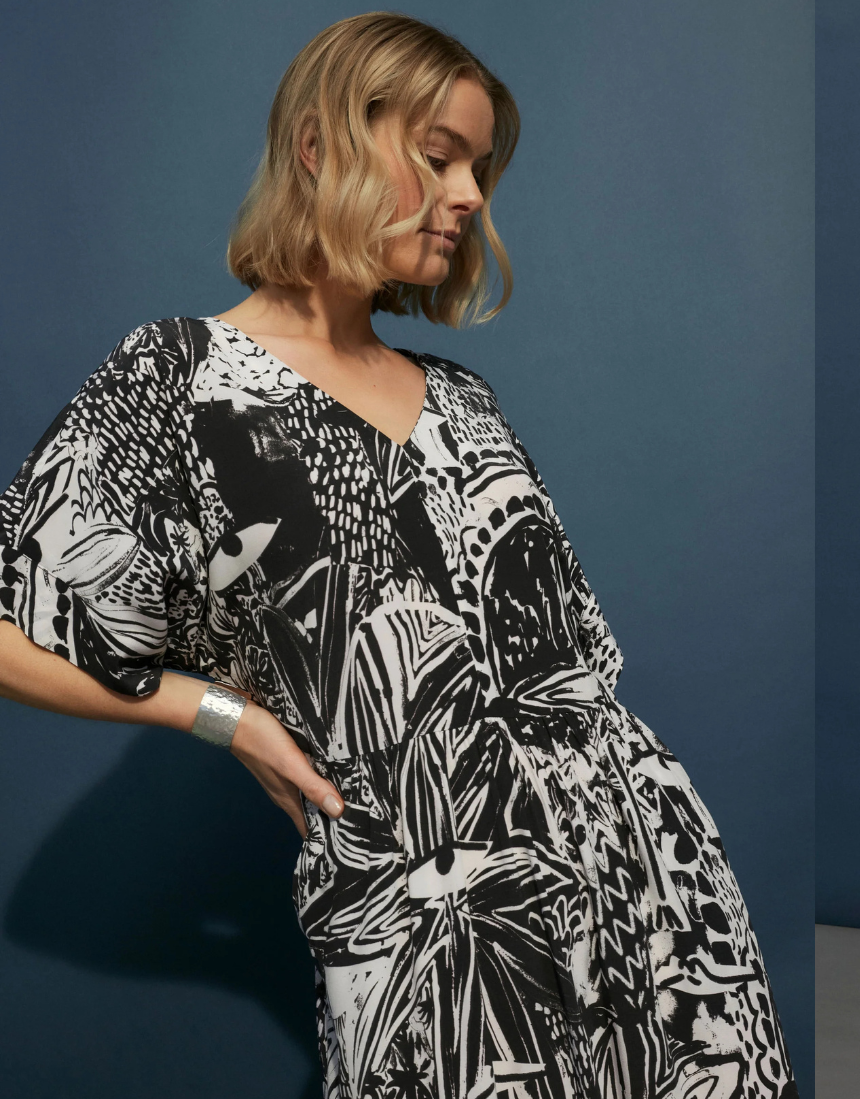Elk Lento Dress in soft fabric, featuring a relaxed fit and stylish design, displayed on a hanger.