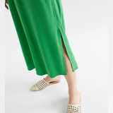 Elk Olyck Midi Dress shown in a flowing, patterned fabric, featuring a relaxed fit and midi length, perfect for casual or dressy occasions.