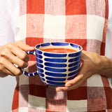 Jones & Co Chino Mug Boss Blue Stripe showing a ceramic mug with blue stripe pattern and "Boss" text design.