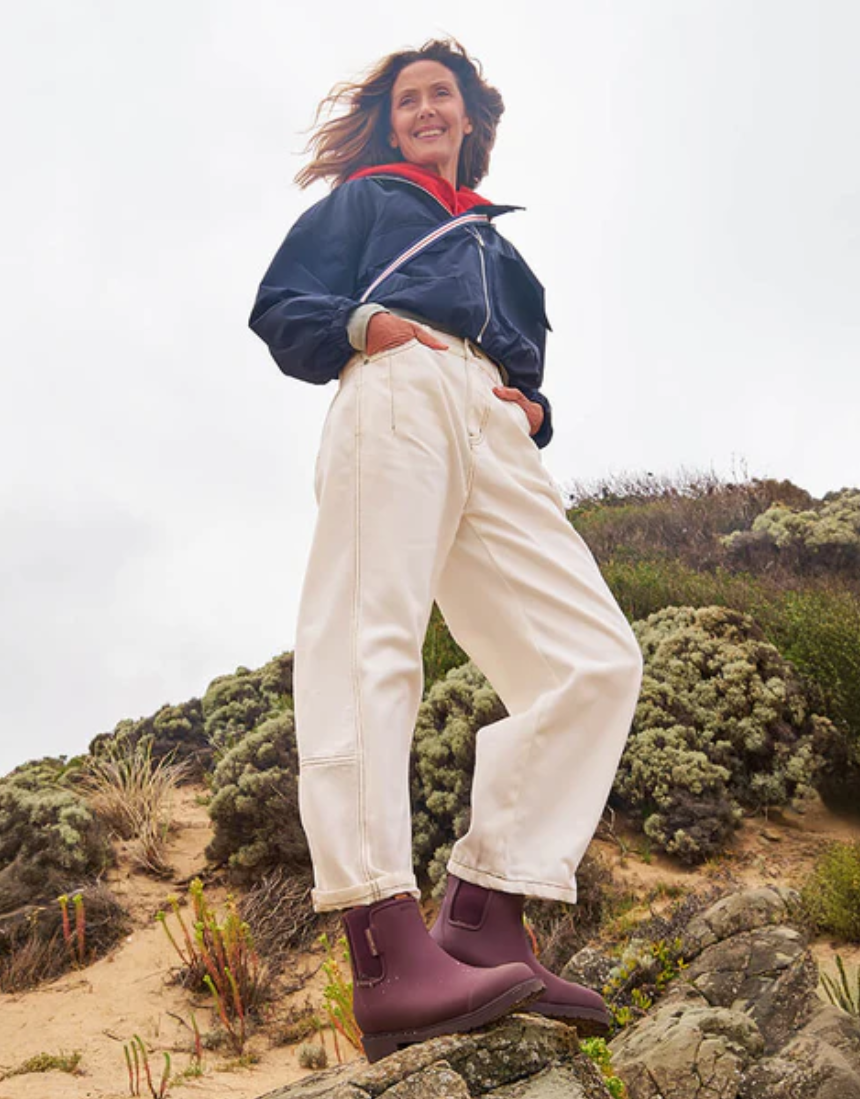 Dark cherry Merry People Bobbi gumboots with waterproof rubber and slip-resistant soles, ideal for wet weather.