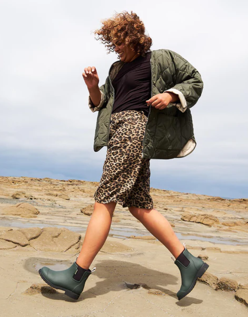 Merry People Bobbi gumboots in forest green, waterproof rubber footwear for women, with a sturdy sole and stylish design.