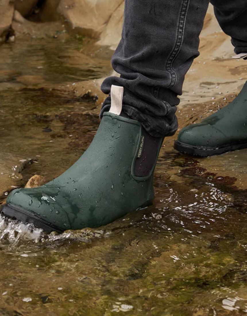 Forest green Merry People Bobbi gumboots shown, waterproof rubber rain boots with a stylish, practical design for wet weather.