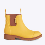 Yellow Merry People Bobbi gumboots with sunflower pattern, waterproof rubber footwear for rainy days.