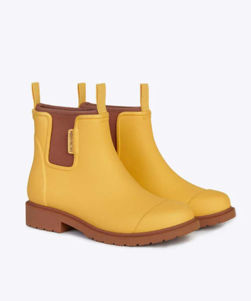 Yellow Merry People Bobbi gumboots with sunflower design, waterproof rubber footwear for rainy weather.