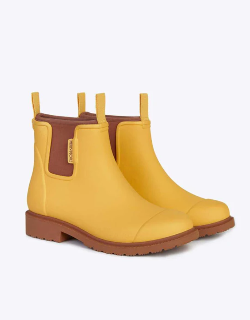 Yellow Merry People Bobbi gumboots with sunflower design, waterproof rubber footwear for rainy weather.