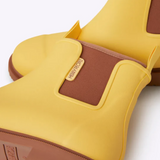 Yellow Merry People Bobbi gumboots with sunflower design, waterproof rubber rain boots for women, stylish and durable footwear