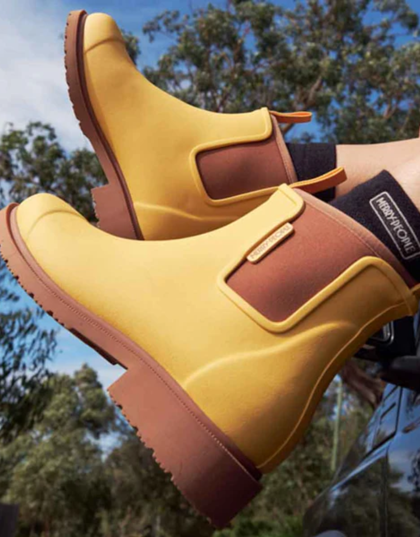 Merry People Bobbi Gumboot in sunflower yellow, waterproof rubber rain boots with a glossy finish and sturdy sole.