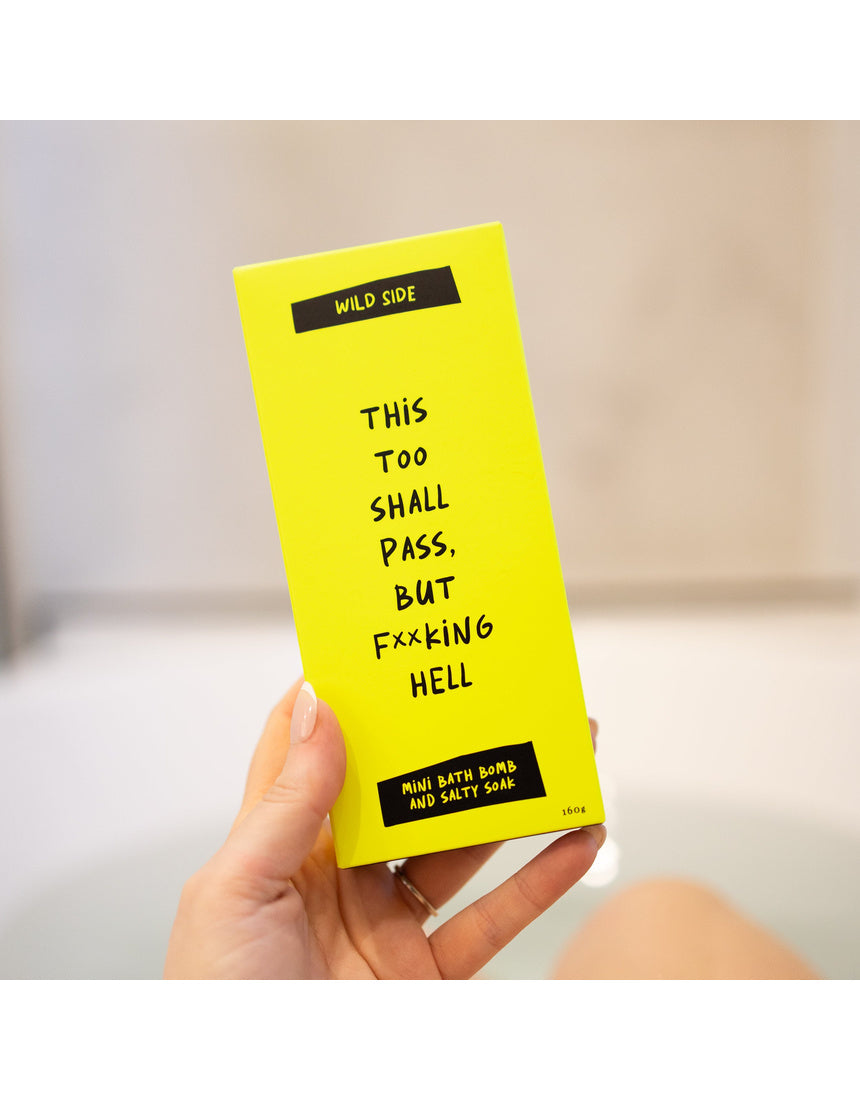 Wild Emery This Too Shall Pass But F**king Hell mini bath bomb and salty soak set in product packaging
