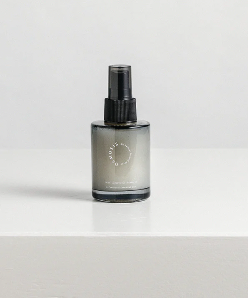 Addition Studio Osmosis all-natural room spray bottle, featuring fresh botanical scent and eco-friendly design.