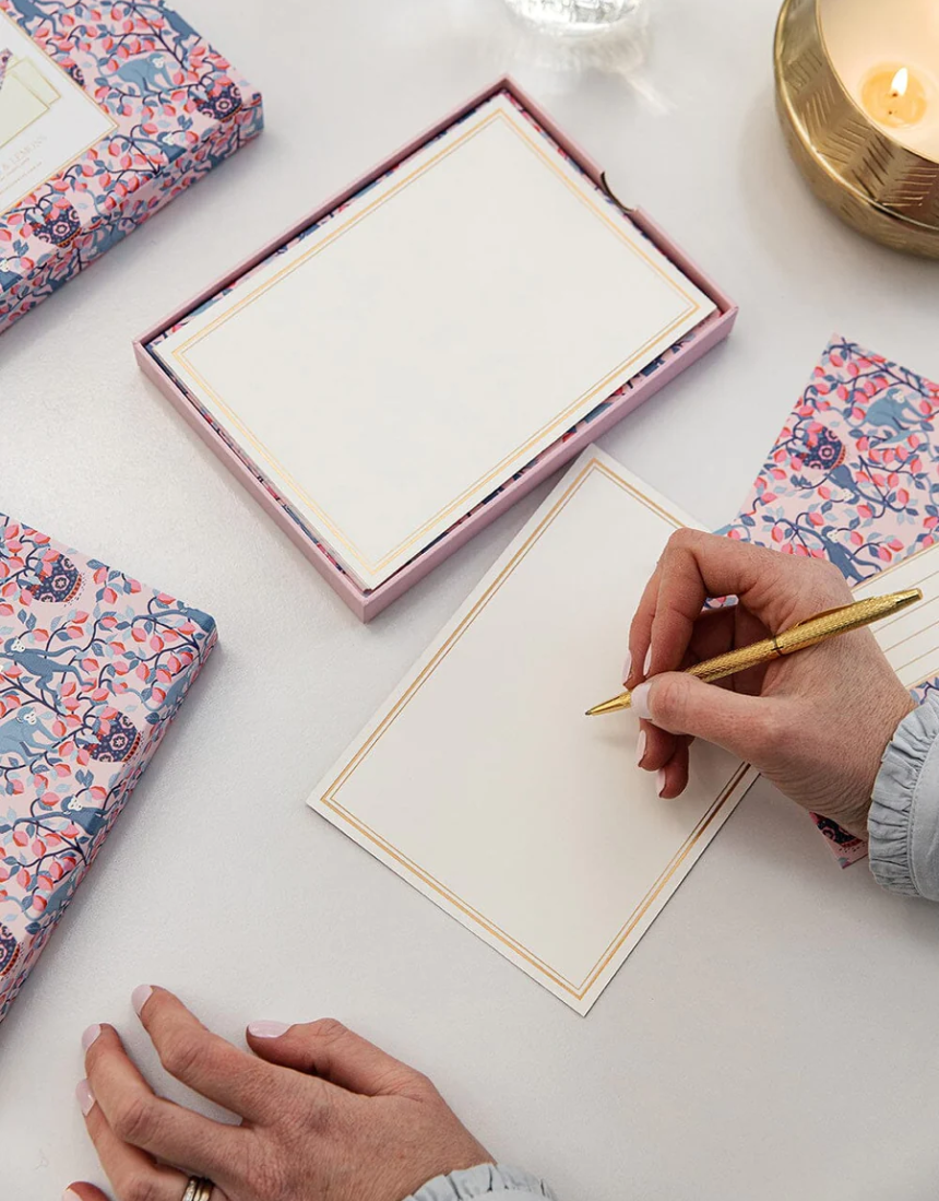 Bespoke Letterpress monkey and lemon-themed greeting and note cards in a writing box set, featuring colorful illustrated designs.