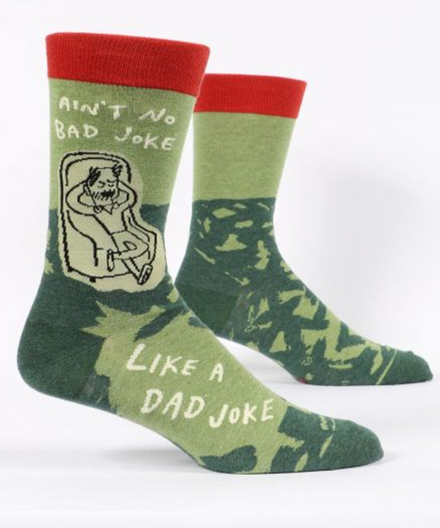 Blue Q men's socks featuring humorous "Ain't No Bad Joke Like A Dad Joke" design, in vibrant blue color.
