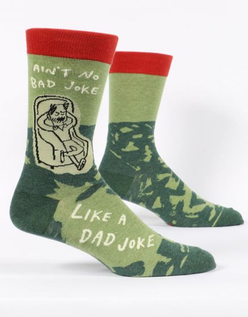 Blue Q men's socks featuring humorous "Ain't No Bad Joke Like A Dad Joke" design, in vibrant blue color.