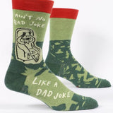 Blue Q men's socks featuring humorous "Ain't No Bad Joke Like A Dad Joke" design, in vibrant blue color.
