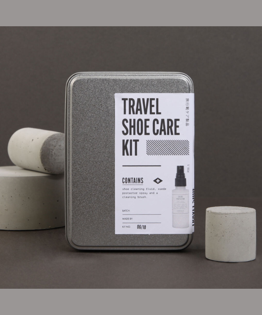 Men's Society travel shoe care kit with brushes and polish for men's shoes, compact shoe maintenance set in a portable case.