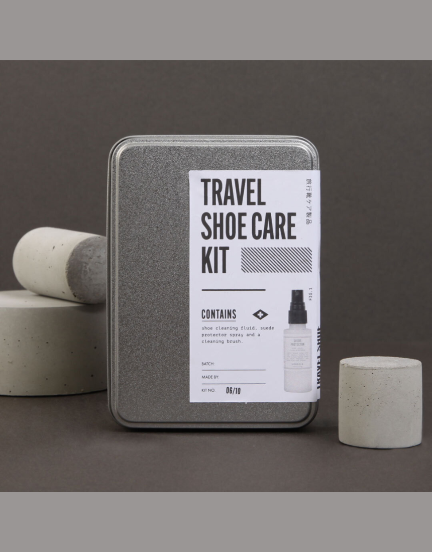 Men's Society travel shoe care kit with brushes and polish for men's shoes, compact shoe maintenance set in a portable case.