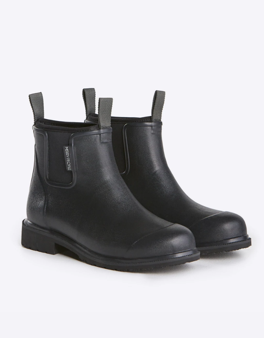 Black Merry People Bobbi Gumboot shoes with waterproof rubber soles and stylish design, perfect for rainy weather.