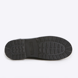 Black Merry People Bobbi Gumboot shoes with tall rubber design and textured sole, stylish and waterproof footwear.