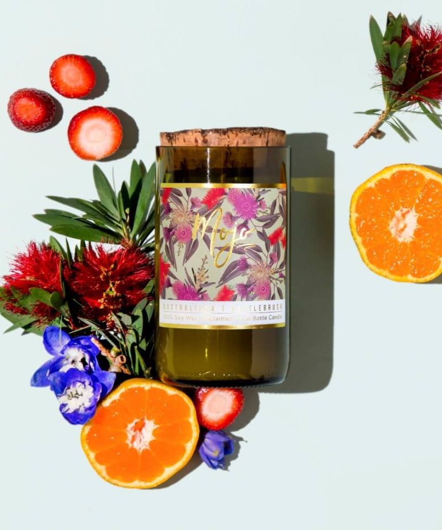 Mojo Candle Co. Bottlebrush Australiana Collection candle with a decorative label and natural wax finish.