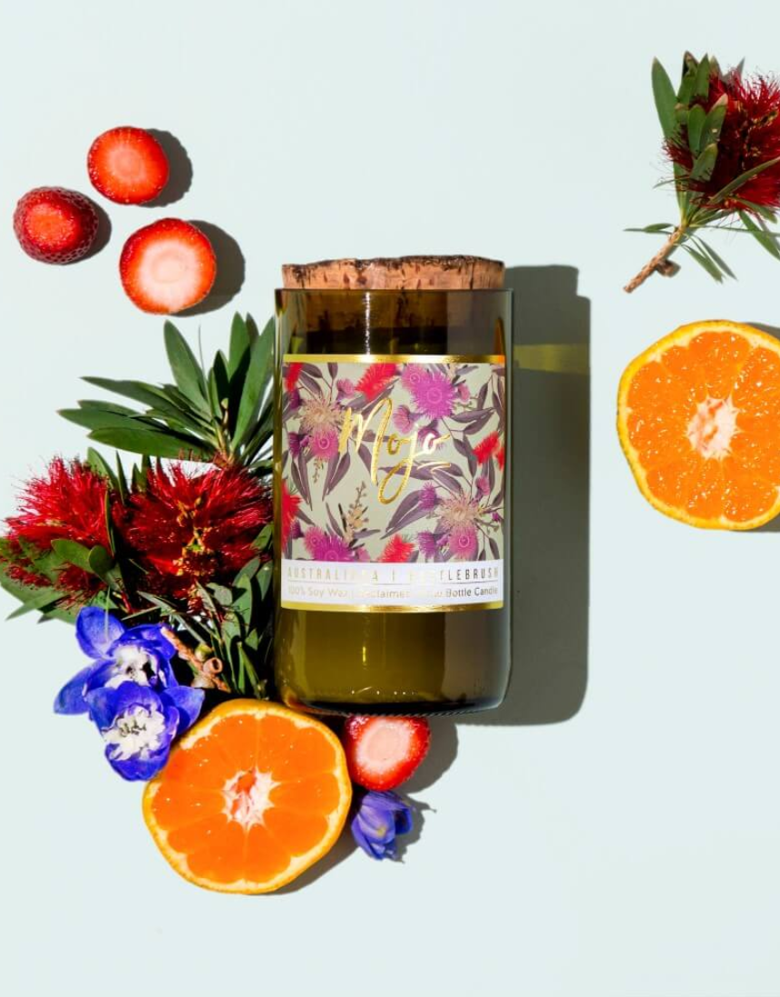 Mojo Candle Co. Bottlebrush Australiana Collection candle with a decorative label and natural wax finish.