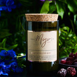 Violet and frosted berries scented candle by Mojo Candle Co. with a frosted glass holder and floral design.