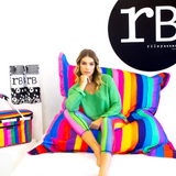 Riley Burnett Carnival Stripe Bean Bag Picnic Rug with colorful striped fabric and comfortable padding for outdoor seating
