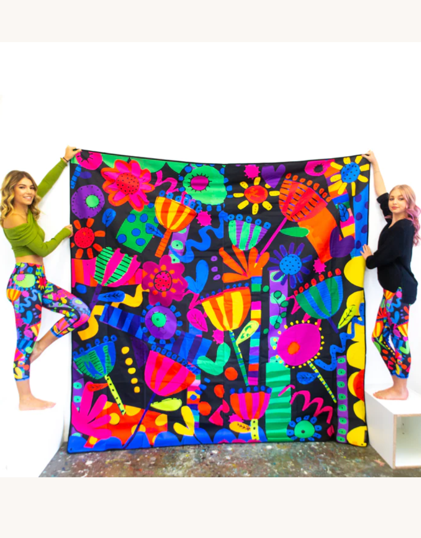 Riley Burnett Flower Fiesta picnic rug with vibrant floral pattern, outdoor blanket for picnics and outdoor gatherings.