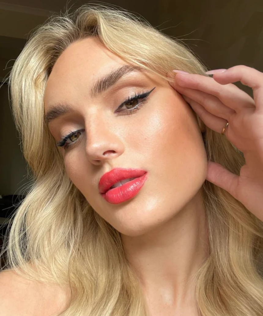 Suzy Lipsticks Suzy x SJ satin lipstick in a sleek tube, featuring a smooth, creamy finish and soft pink shade.
