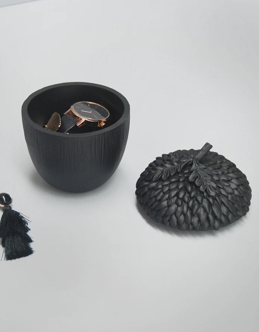 White Moose resin acorn-shaped box in black, designed as a decorative vase or pot for stylish home decor.