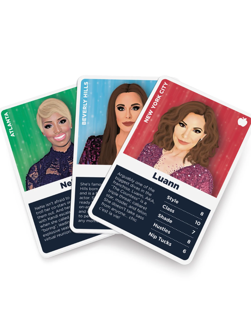 William Valentine The Ultimate Housewives Card Game, colorful game cards featuring humorous housewife themes and characters.